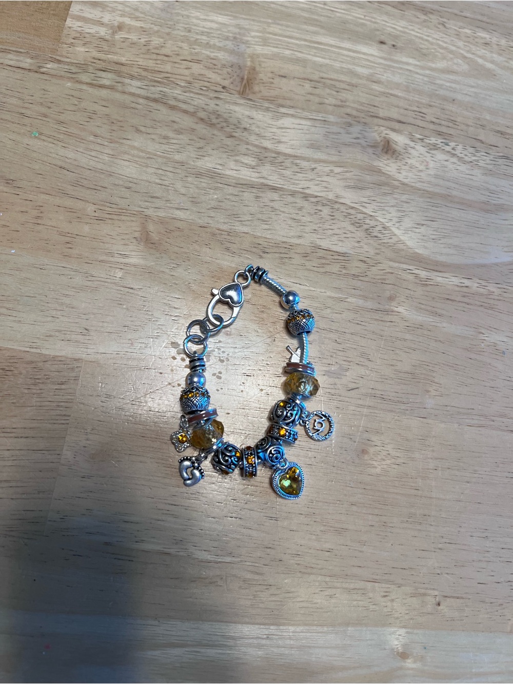 Silver Charm Bracelet with Yellow Crystal Accents